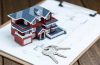 villa-house-model-key-drawing-retro-desktop-real-estate-sale-concept